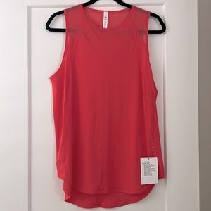 NWT Lululemon Sculpt Tank in size 10. Coral color.